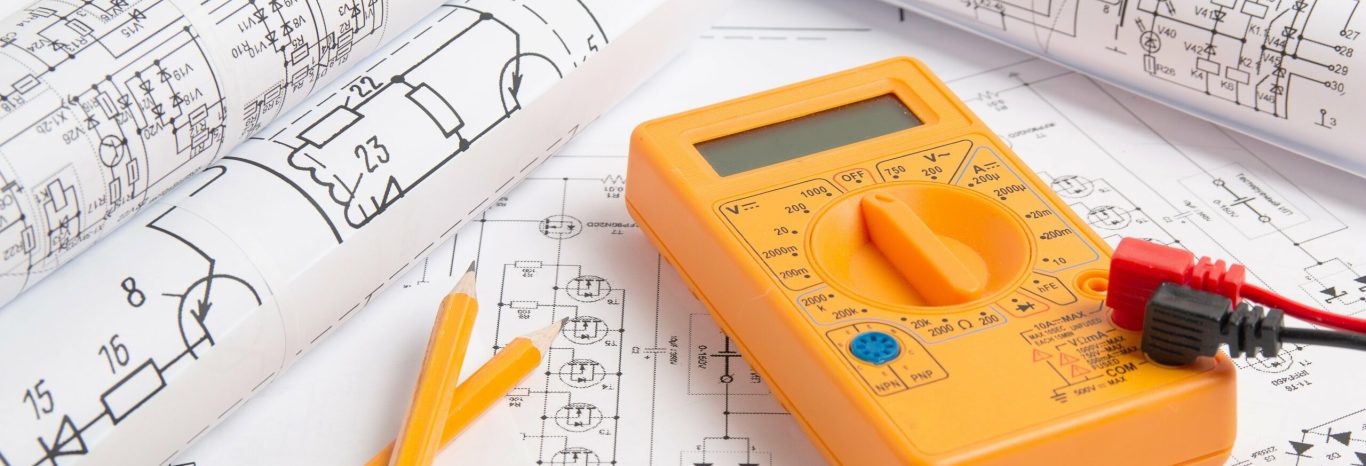 electrical-engineering-drawings-pencil-digital-multimeter-min